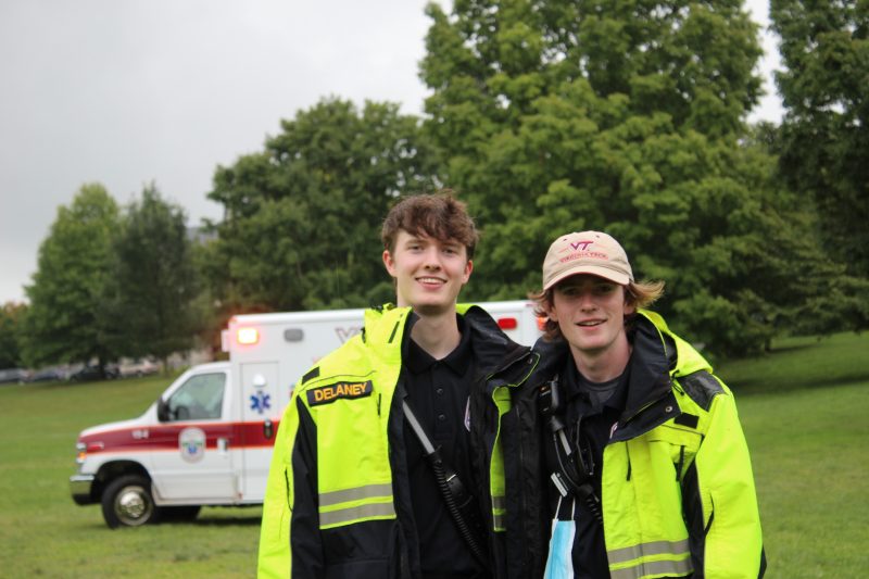 photo of two VTRS officers in front of Life Guard helicopter