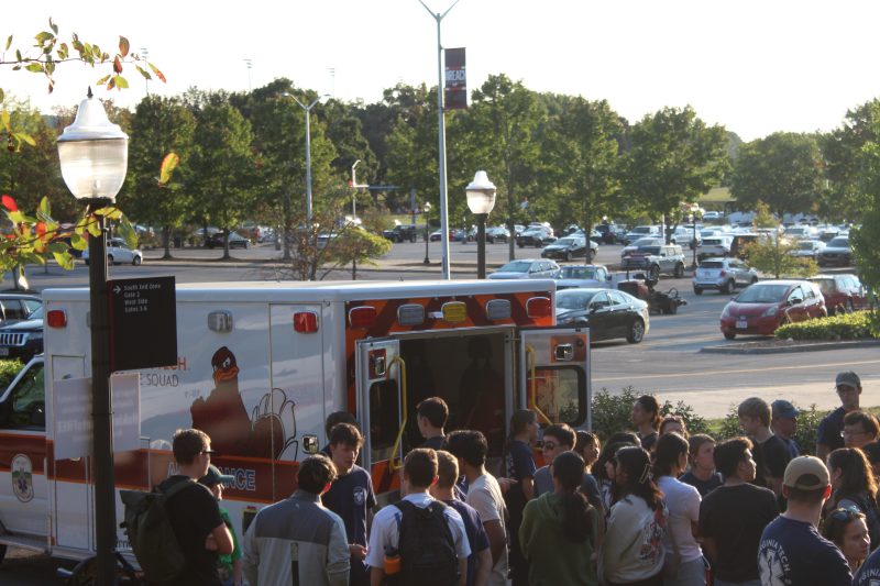 Two squad members posed in front of ambulence